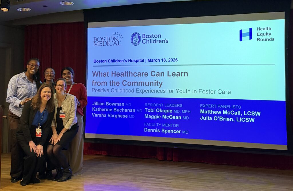 A group of BCRP resident presenting in the Folkman Auditorium